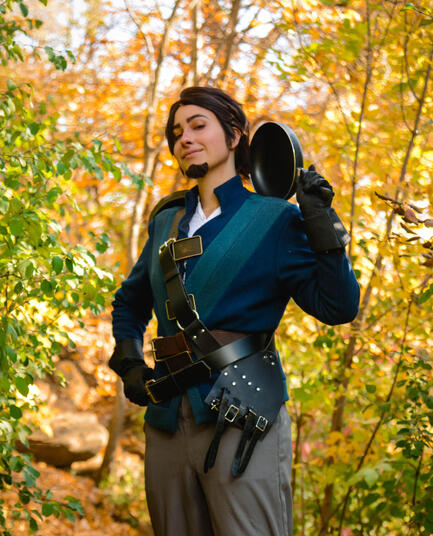 My Season 2 Eugene Fitzherbert cosplay in a fall-colored forest